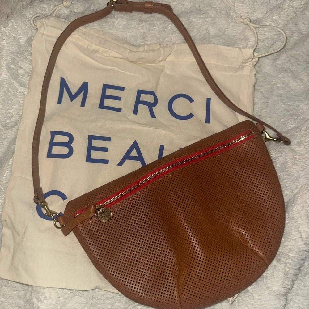 Chic Brown Leather Crossbody Bag with Red Accents